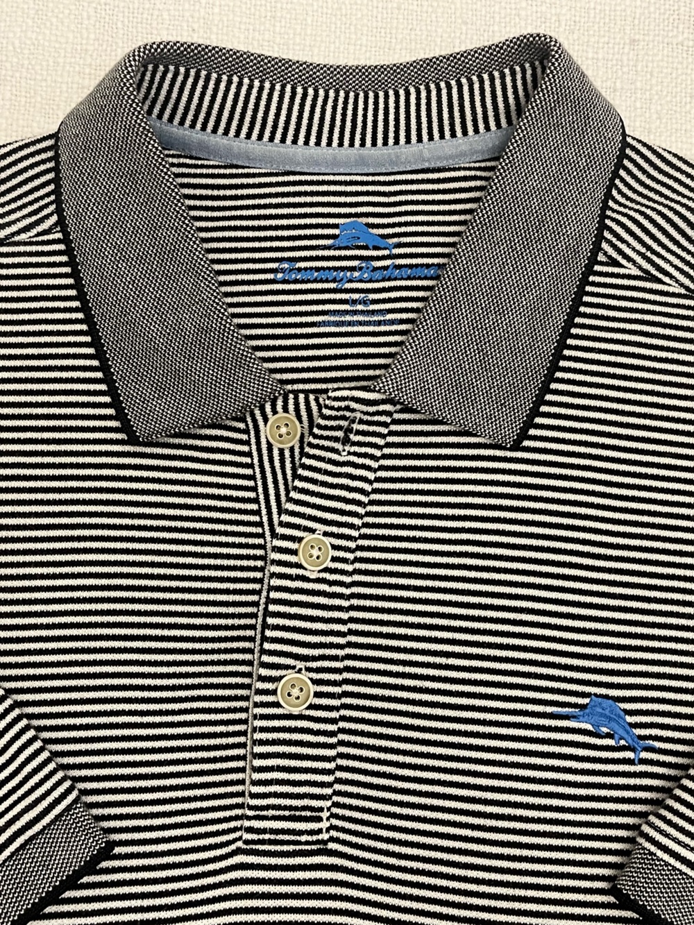 Tommy Bahama Black & White Striped Polo with Blue Dolphin Logo